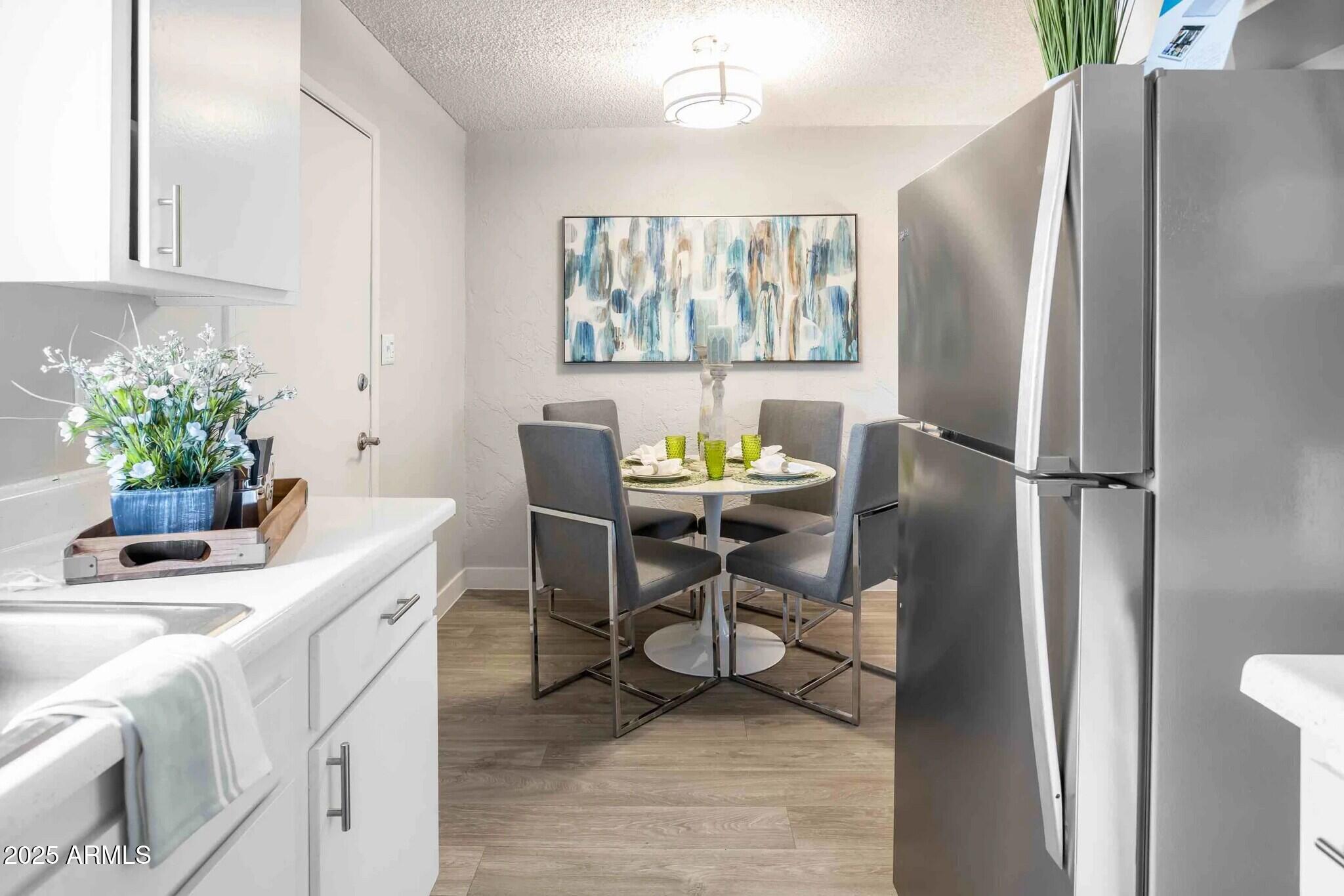 2627 North 45th Avenue, Unit 2P Phoenix, AZ 85035 - Photo 3 of 29 VDA_Dining