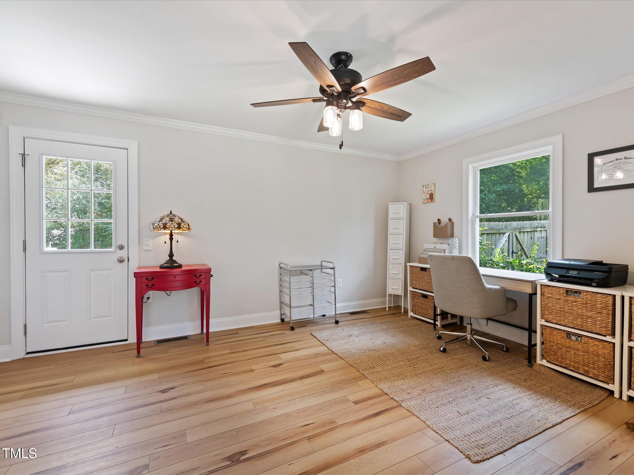 3320 High Gate Road Raleigh, NC 27603 - Photo 27 of 40 The flex space is shown as home office. This room has exterior entrance, built-ins and large closet.