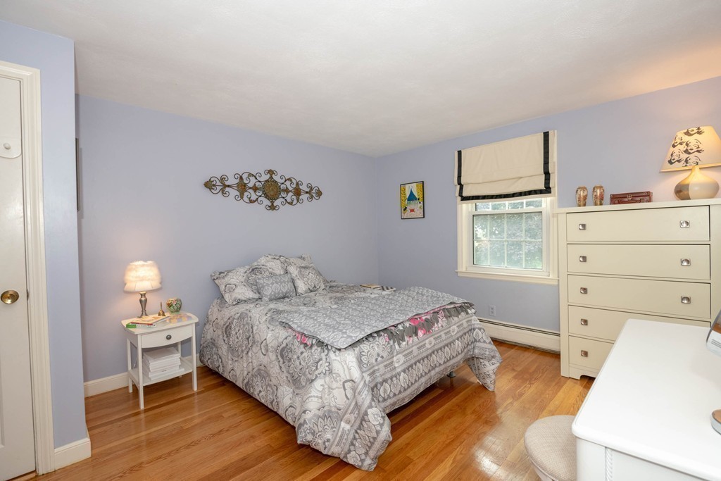 24 Hawthorn Road Marblehead, MA 01945 - Photo 23 of 30 a bedroom with a bed and a dresser