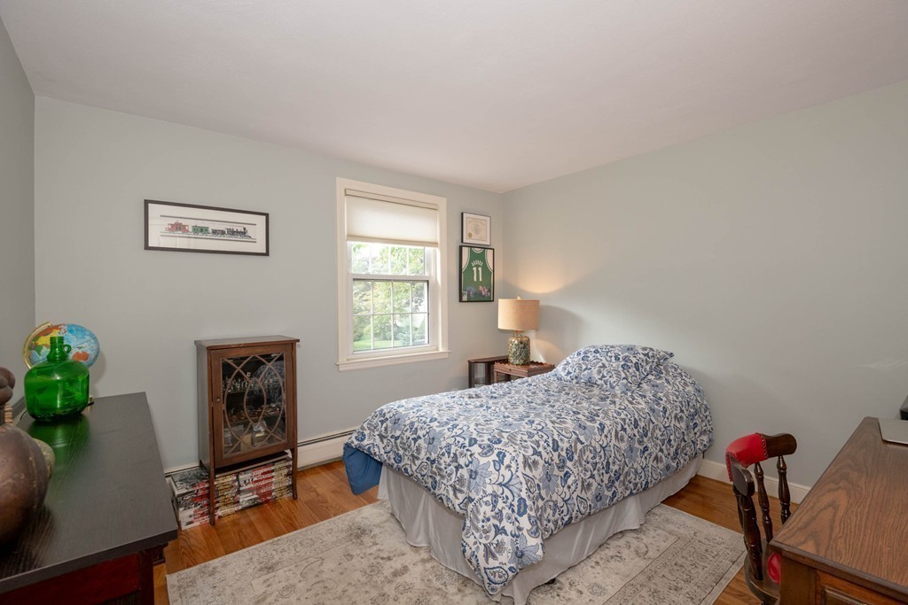 24 Hawthorn Road Marblehead, MA 01945 - Photo 25 of 30 a bedroom with a bed and a window