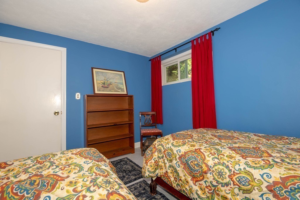 24 Hawthorn Road Marblehead, MA 01945 - Photo 30 of 30 a bedroom with a bed and a dresser