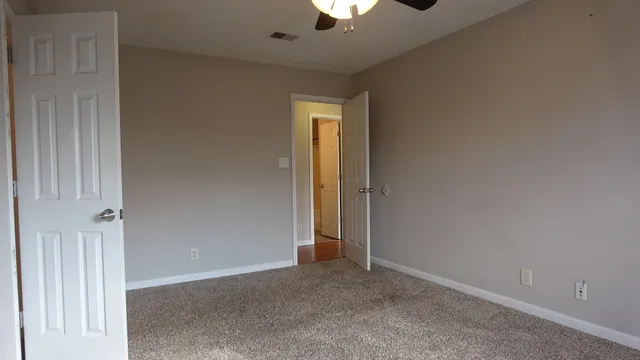 an empty room that has a window in it