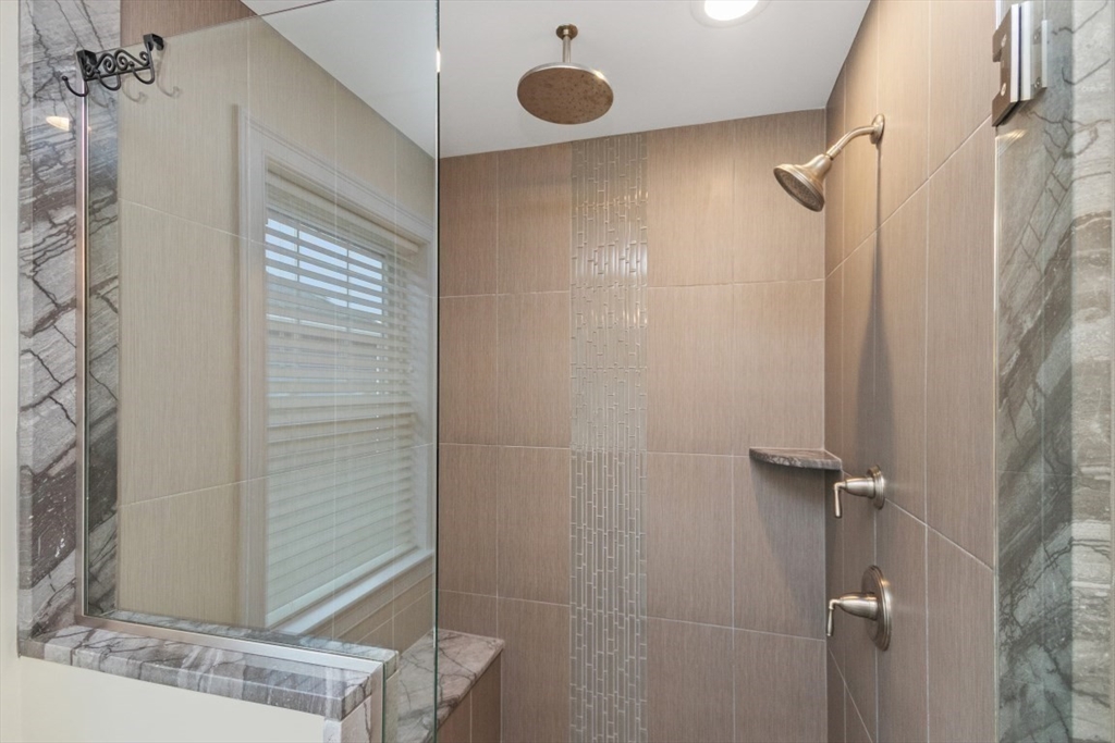 141 Ash Street, Unit 1 Waltham, MA 02453 - Photo 17 of 31 a bathroom with a shower