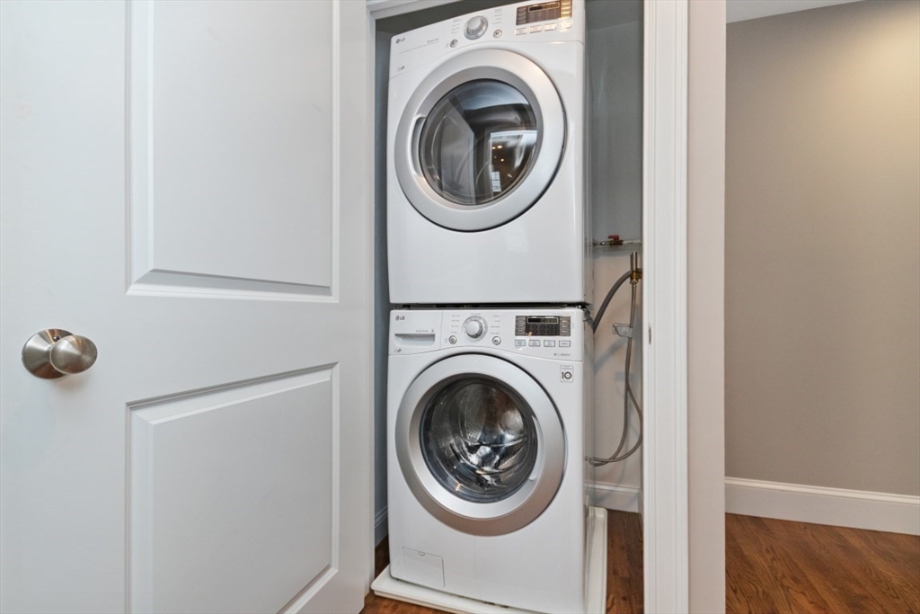141 Ash Street, Unit 1 Waltham, MA 02453 - Photo 24 of 31 a close up view of a washer and dryer