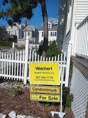 a sign on the side of a building