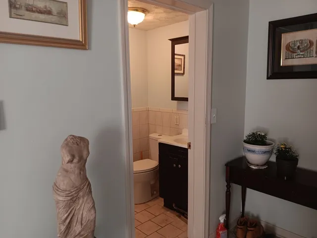 a kitchen with a refrigerator sink and stove