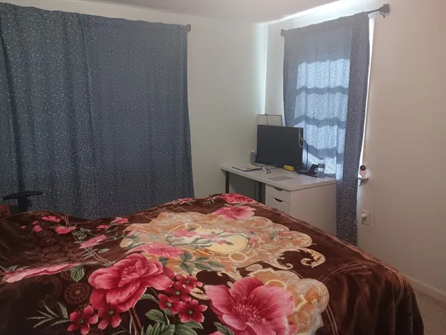 a view of workspace with lounge chair