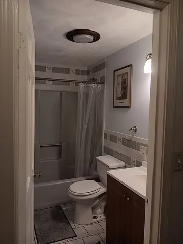 a view of a hallway with the door