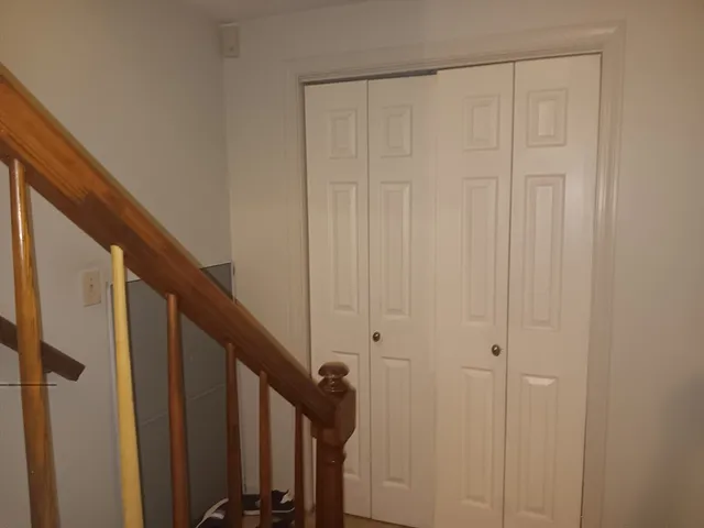 a view of a workspace with furniture