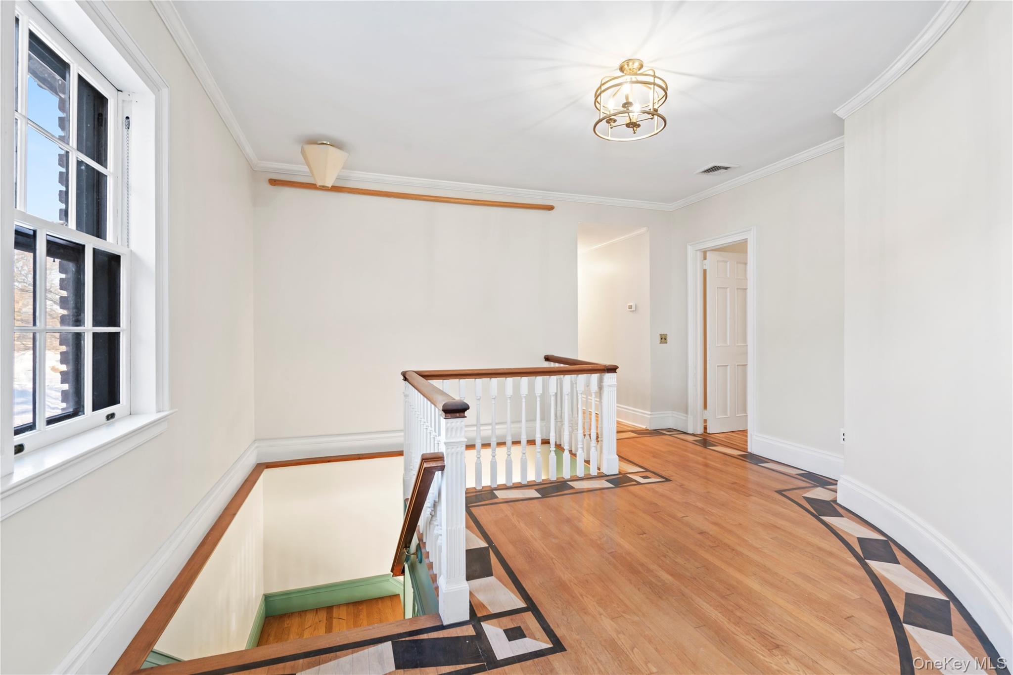 203 Store Hill Road Old Westbury, NY 11568 - Photo 18 of 50 a view of a room with furniture and wooden floor