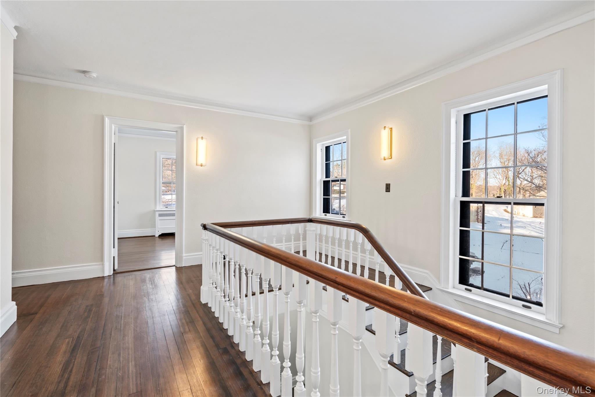 203 Store Hill Road Old Westbury, NY 11568 - Photo 25 of 50 a view of a hallway with wooden floor and entryway