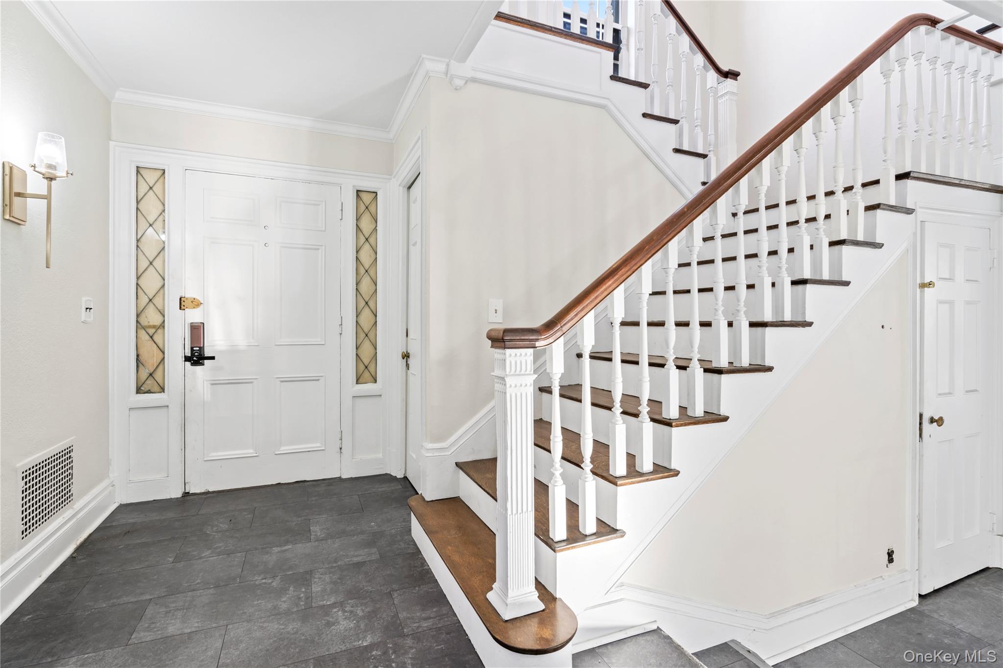 203 Store Hill Road Old Westbury, NY 11568 - Photo 31 of 50 a view of entryway with wooden floor and stairs