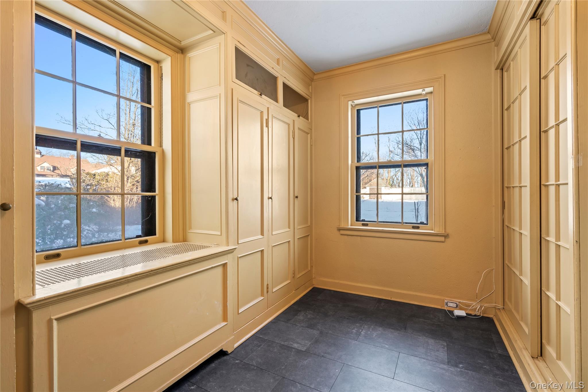 203 Store Hill Road Old Westbury, NY 11568 - Photo 36 of 50 an empty room with windows