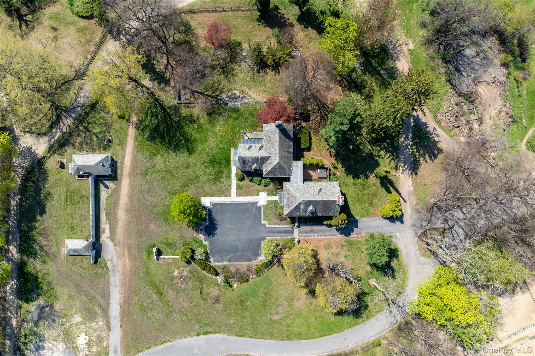 203 Store Hill Road Old Westbury, NY 11568 - Photo 43 of 50 an aerial view of a house with outdoor space