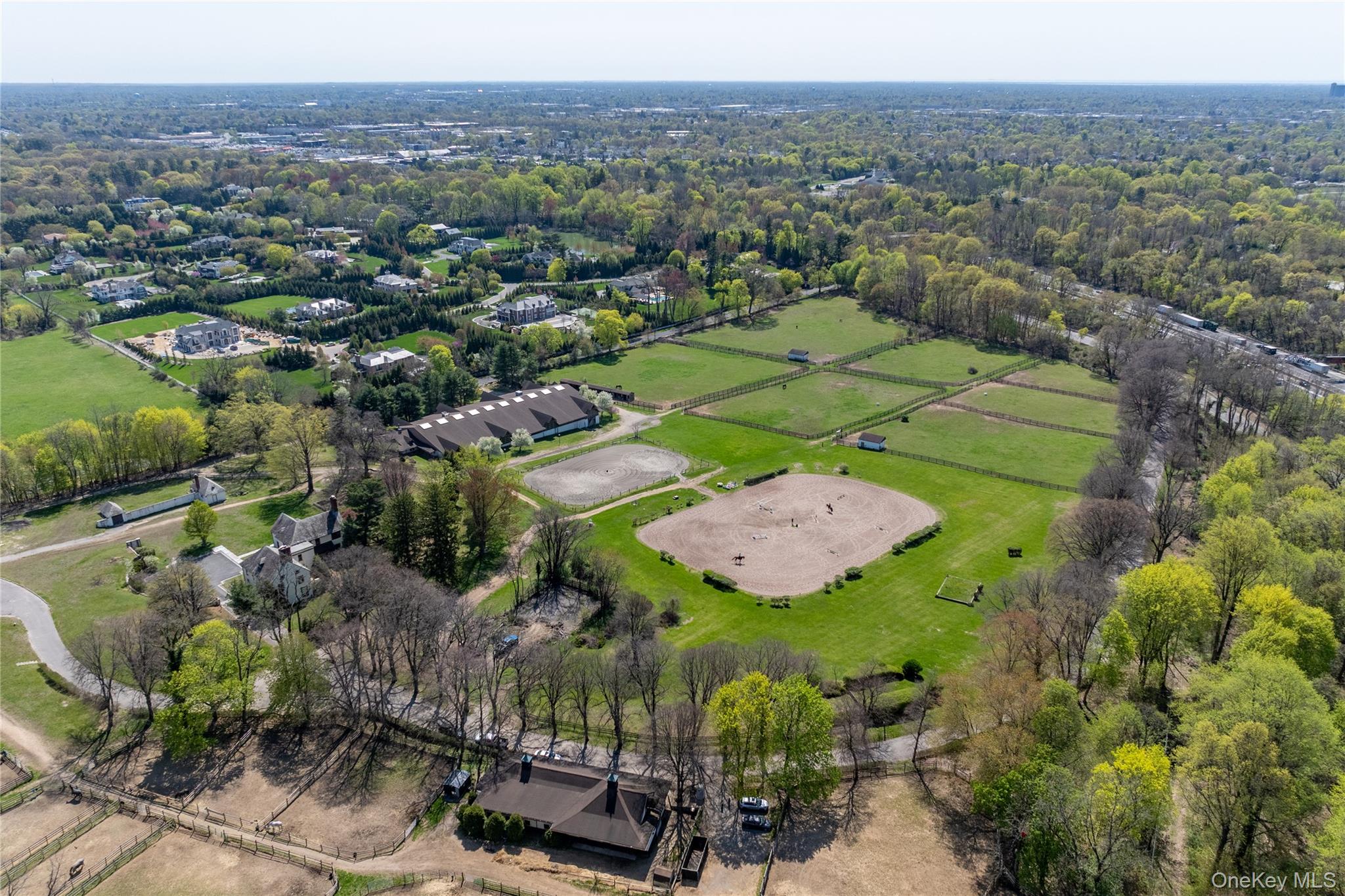 203 Store Hill Road Old Westbury, NY 11568 - Photo 44 of 50 an aerial view of a house with a garden
