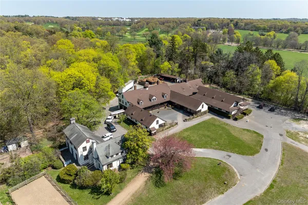 an aerial view of residential house with outdoor space