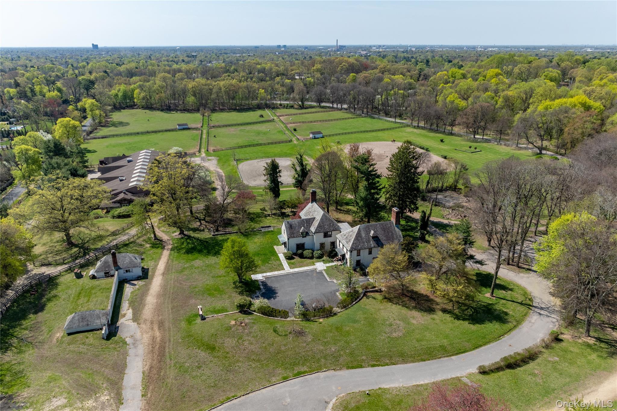 203 Store Hill Road Old Westbury, NY 11568 - Photo 7 of 50 a view of a garden with mountains in the background