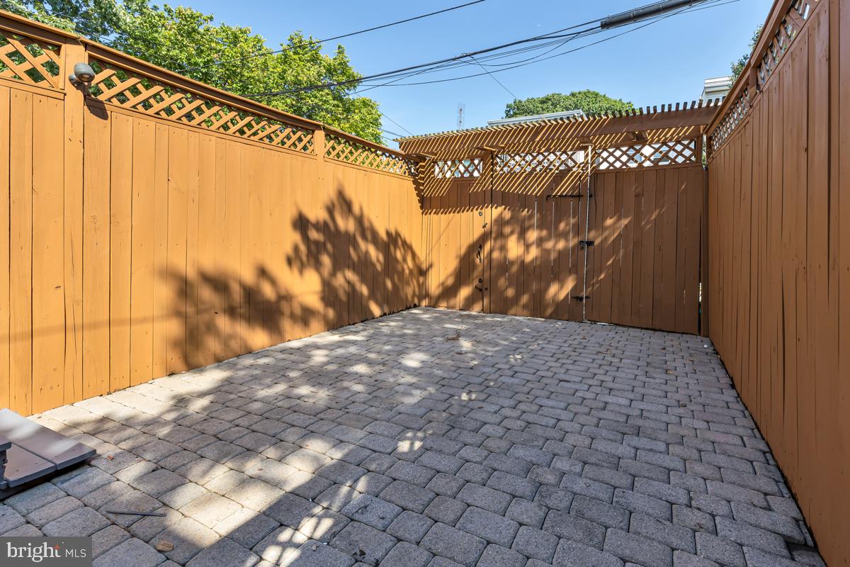 237 14th Place Northeast Washington, DC 20002 - Photo 16 of 29 Paved & fenced back yard perfect for parking