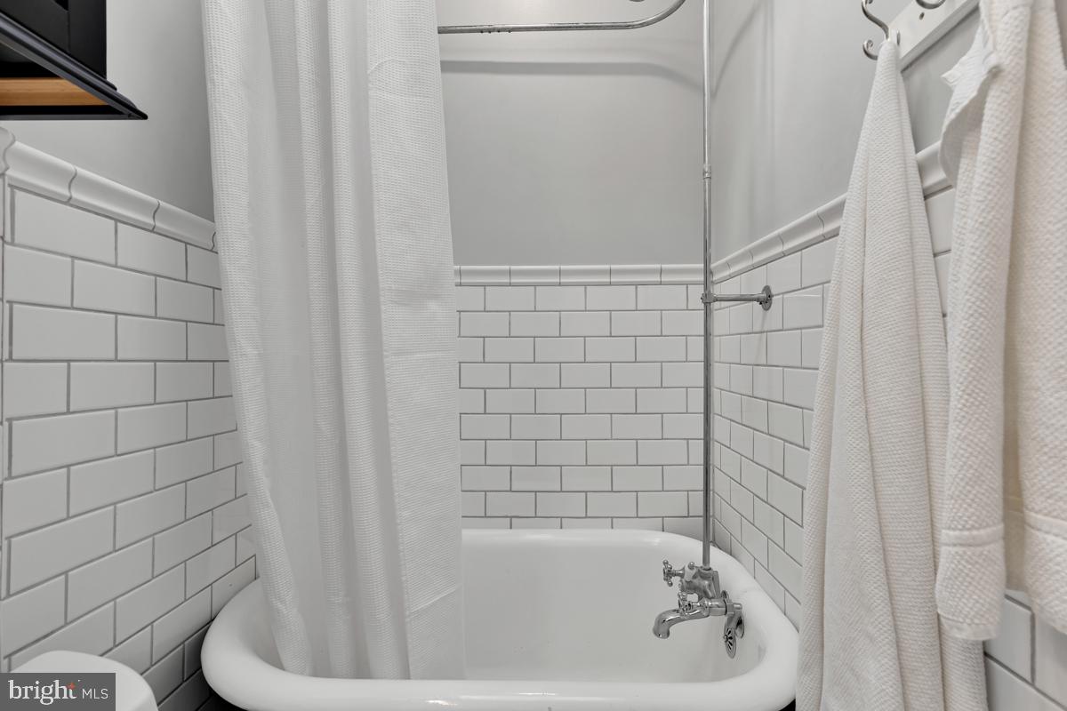 237 14th Place Northeast Washington, DC 20002 - Photo 21 of 29 Vintage claw-foot bathtub and shower