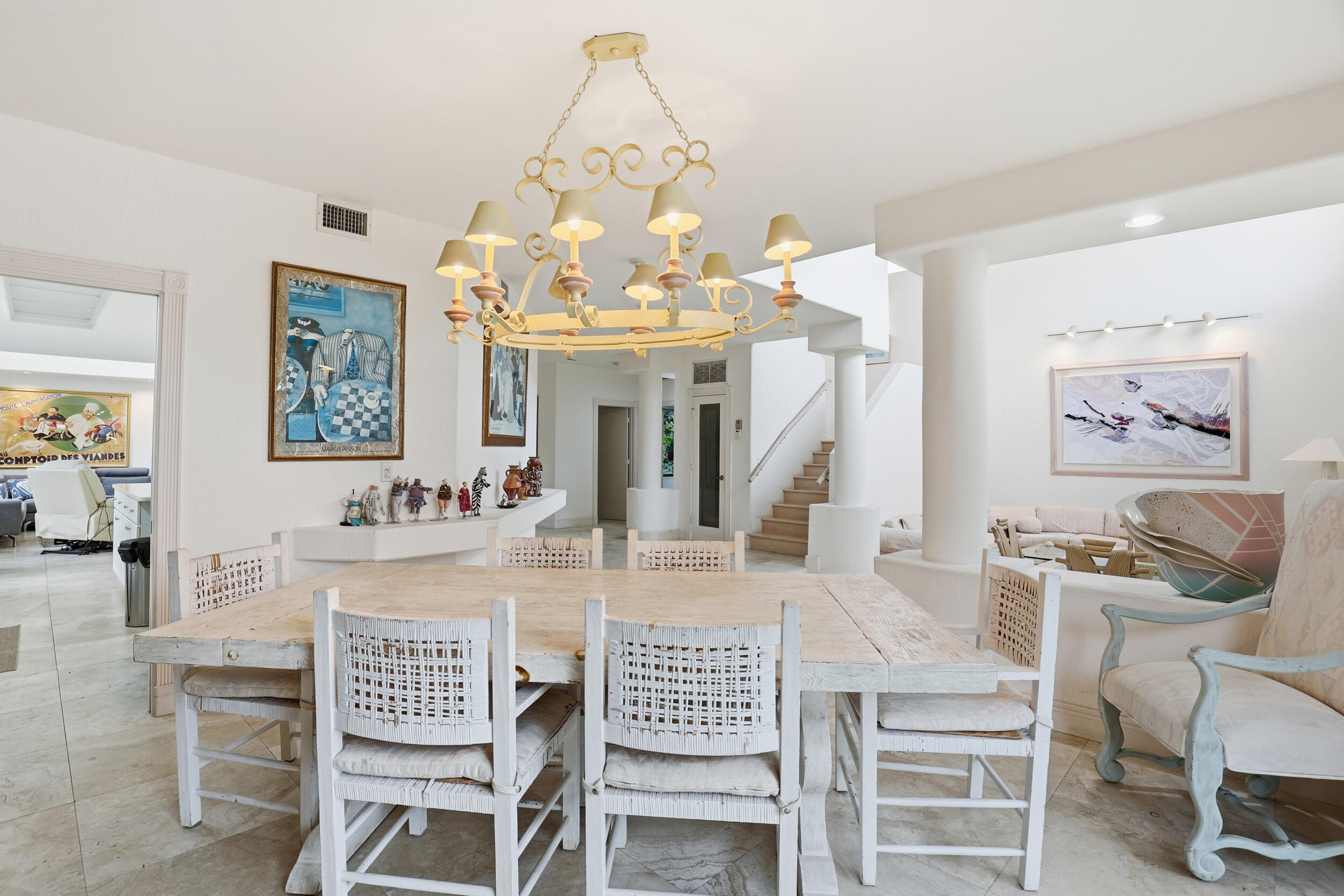2248 Northwest 60th Street Boca Raton, FL 33496 - Photo 19 of 70 a view of a dining room with furniture and a chandelier