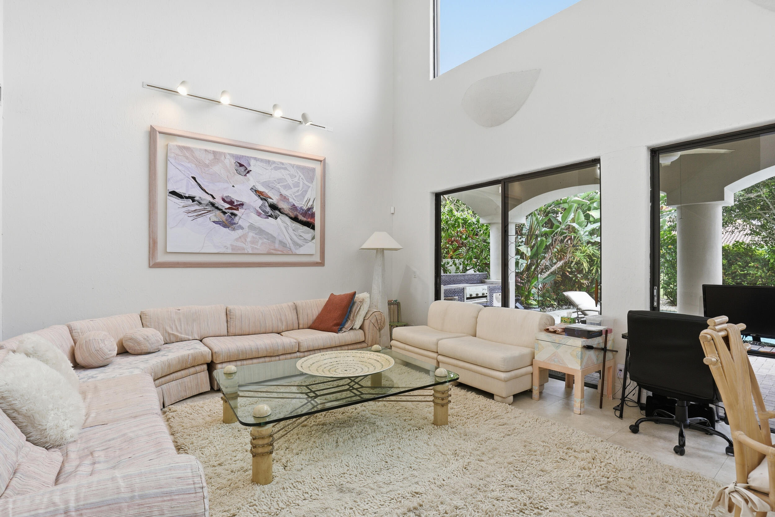 2248 Northwest 60th Street Boca Raton, FL 33496 - Photo 23 of 70 a living room with furniture and a large window