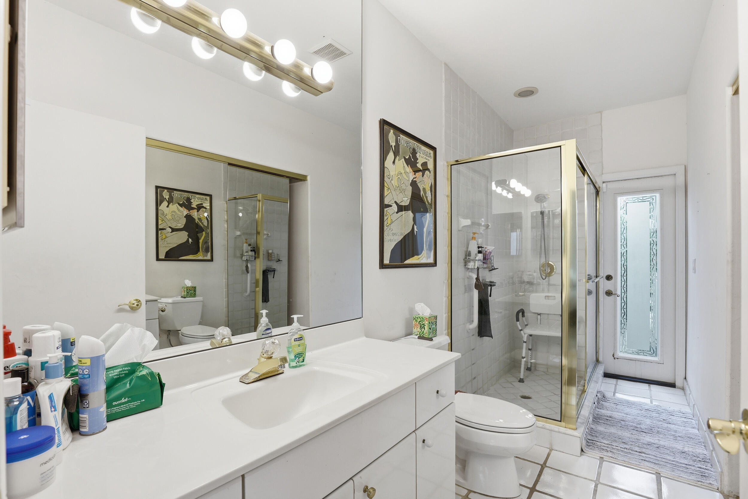 2248 Northwest 60th Street Boca Raton, FL 33496 - Photo 29 of 70 a bathroom with a sink vanity granite toilet and a shower