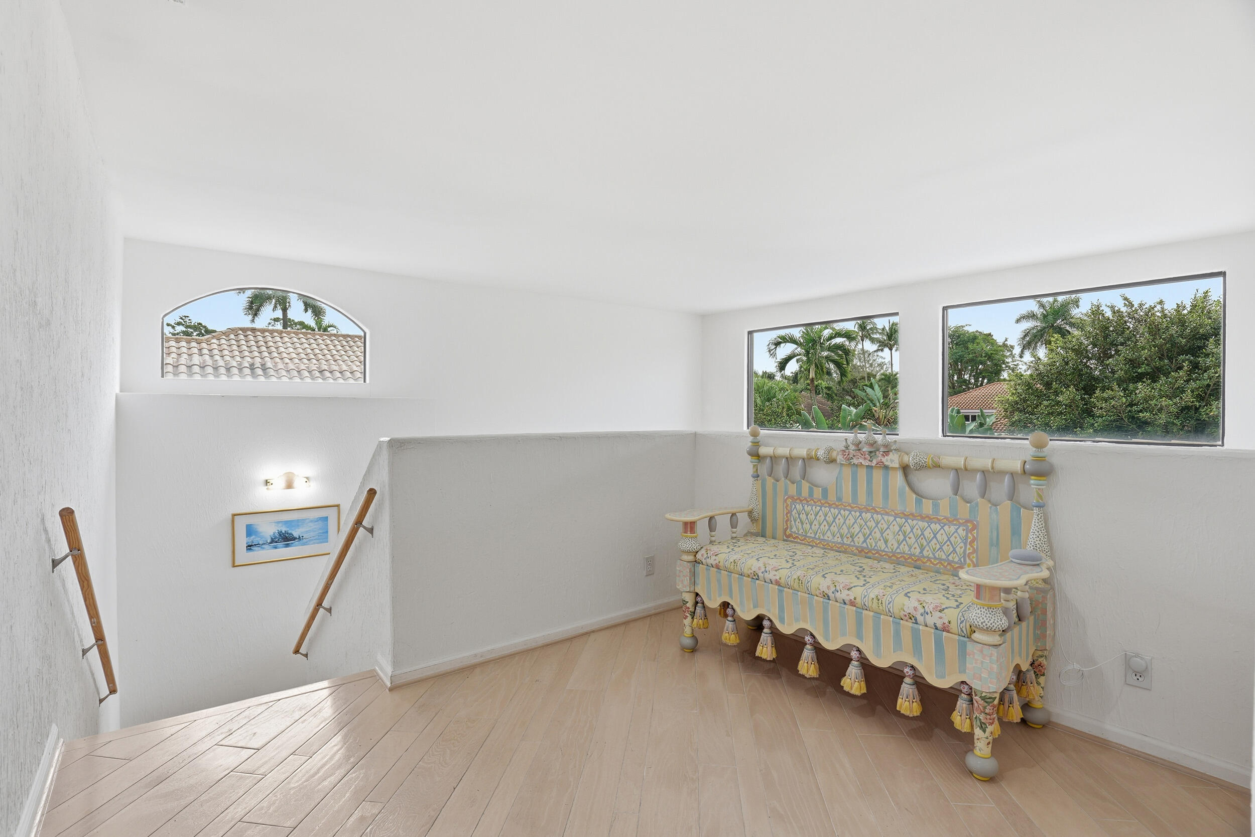 2248 Northwest 60th Street Boca Raton, FL 33496 - Photo 31 of 70 a living room with a couch and a window