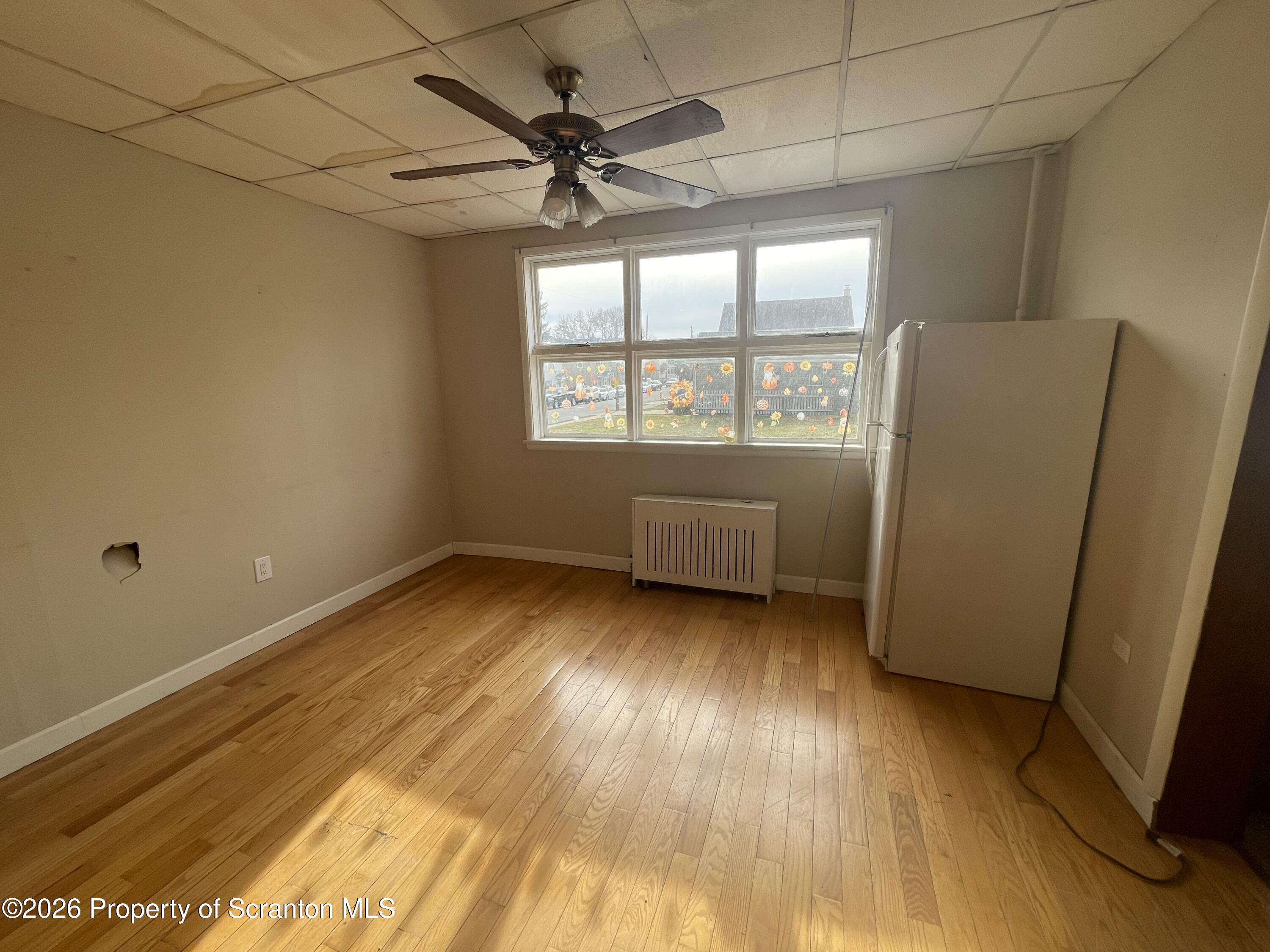 401 Putnam Street Scranton, PA 18508 - Photo 12 of 29 a view of an empty room with a window