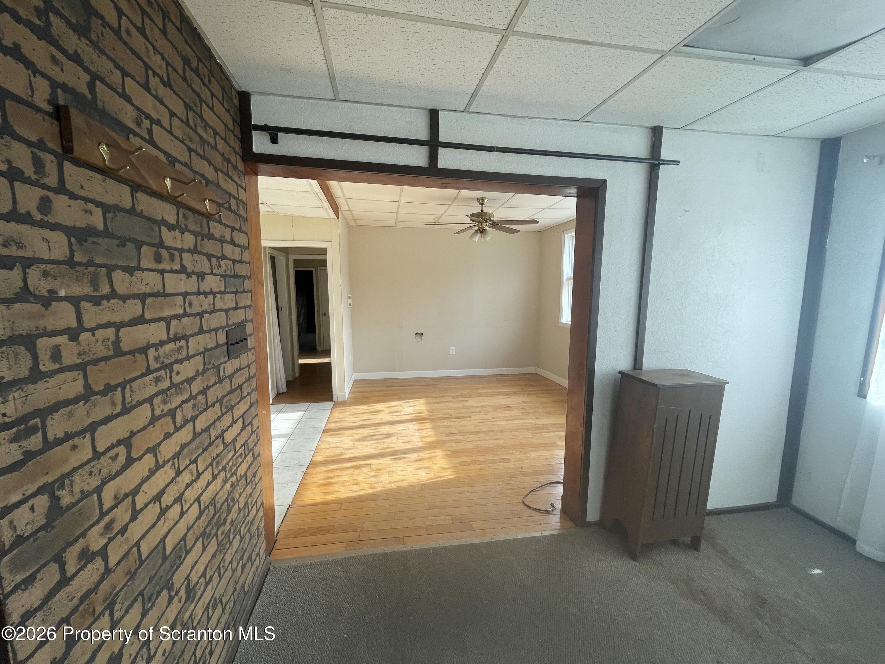 401 Putnam Street Scranton, PA 18508 - Photo 13 of 29 a view of an empty room with a glass door