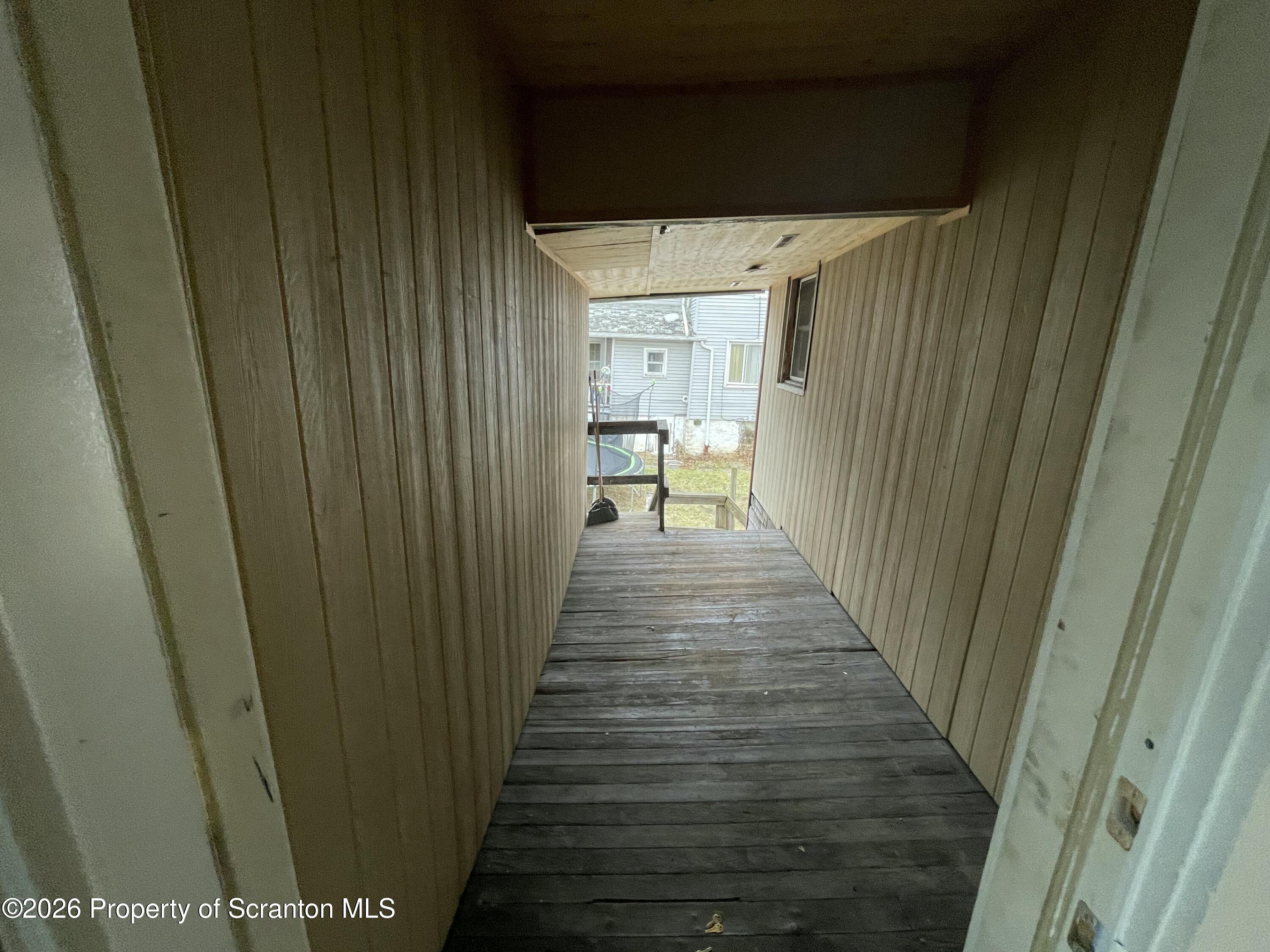 401 Putnam Street Scranton, PA 18508 - Photo 29 of 29 a view of a hallway with wooden floor