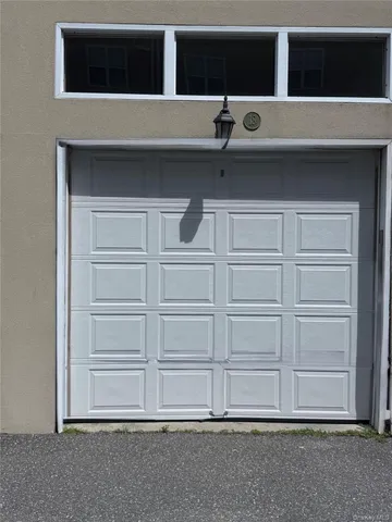 a view of a house with a large window