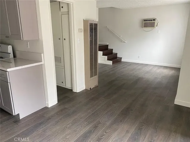 a view of storage and utility room in wooden floor