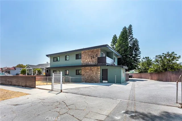 a front view of a house with a garage