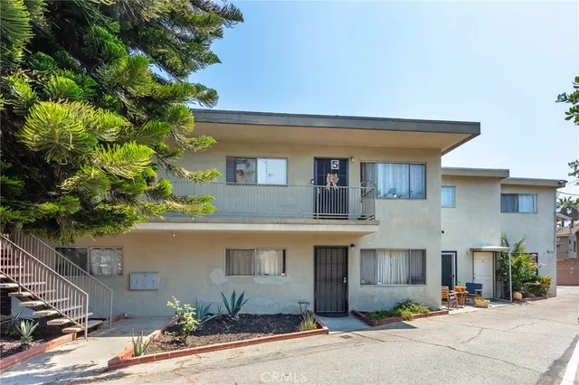 a front view of a house with yard