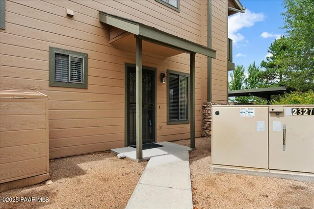 a view of entrance gate of the house