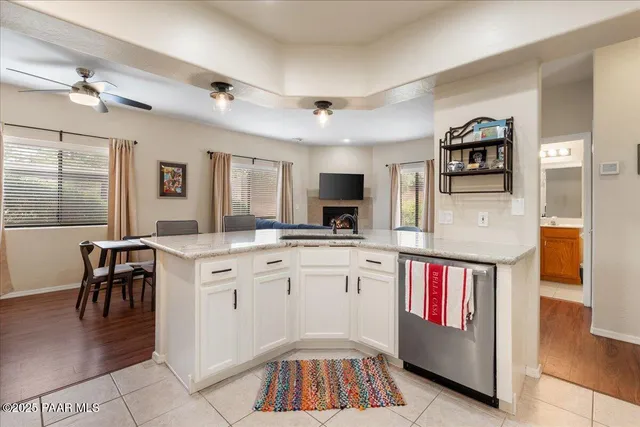 a spacious bathroom with a sink a mirror and a bathtub