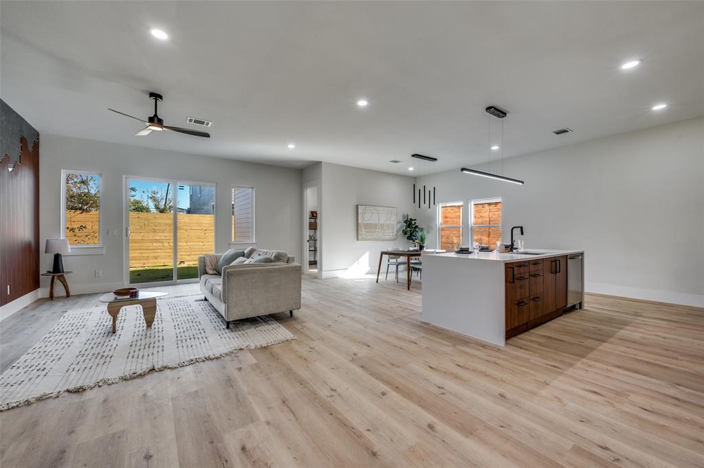 3314 Navaro Street Dallas, TX 75212 - Photo 4 of 24 a living room with furniture and a wooden floor