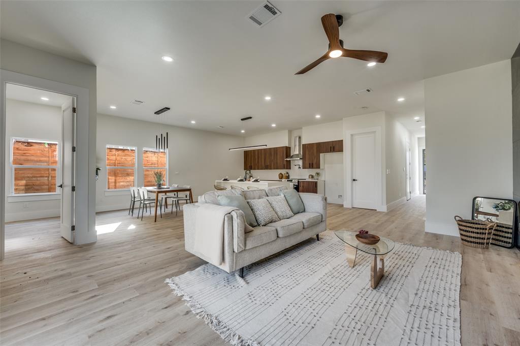 3314 Navaro Street Dallas, TX 75212 - Photo 6 of 24 a living room with furniture and a wooden floor
