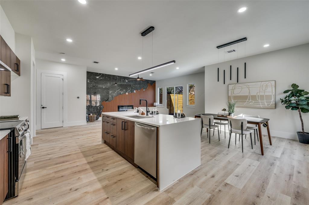 3314 Navaro Street Dallas, TX 75212 - Photo 8 of 24 a kitchen with counter top space and wooden floor