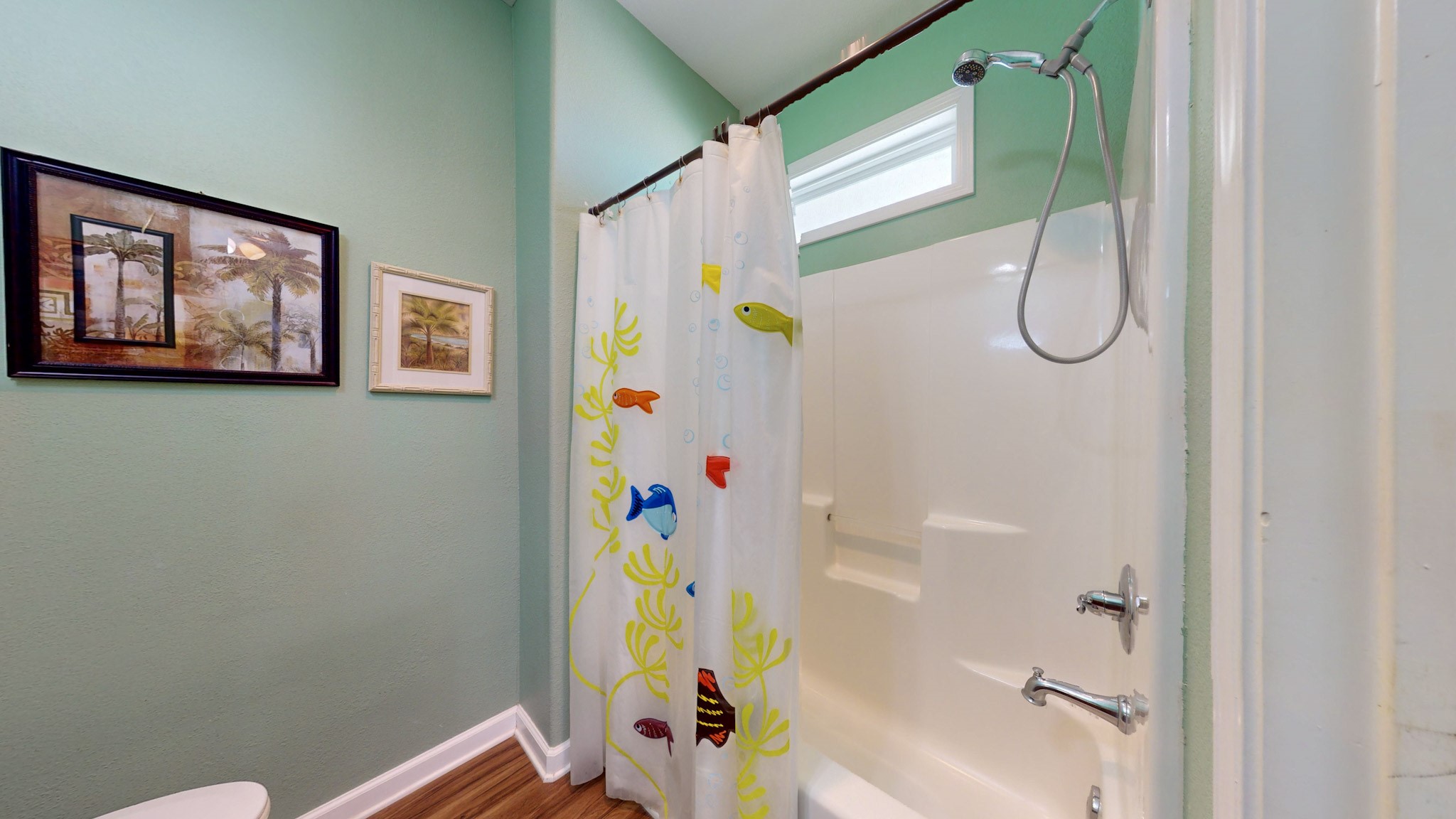 982 Kirks Road Port Bolivar, TX 77650 - Photo 24 of 39 a white bath tub with a shower curtain
