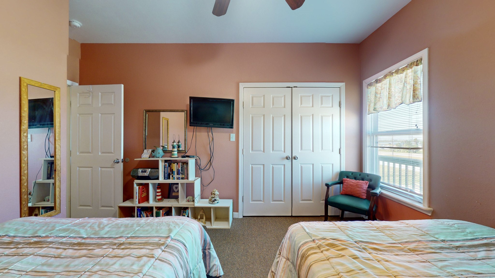 982 Kirks Road Port Bolivar, TX 77650 - Photo 29 of 39 a bedroom with bed and a window