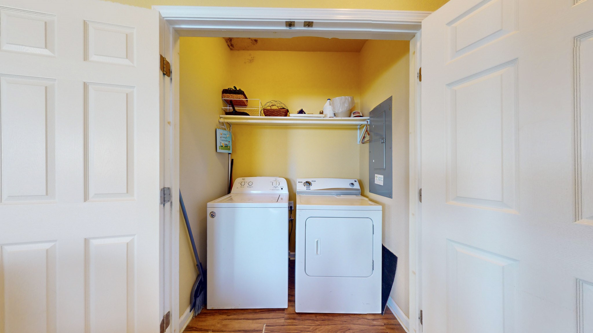 982 Kirks Road Port Bolivar, TX 77650 - Photo 35 of 39 a utility room with wooden floor washer and dryer