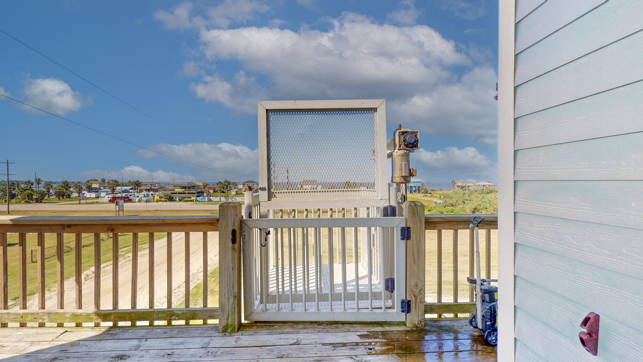 982 Kirks Road Port Bolivar, TX 77650 - Photo 36 of 39 a view of a balcony with wooden floor