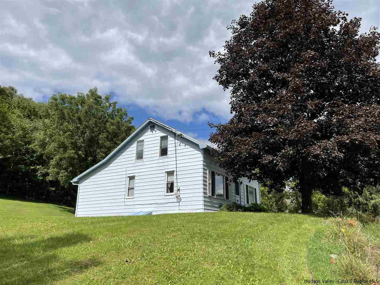 6277 County Rt 36 Denver, NY 12421 - Photo 2 of 27 a view of a house with a yard