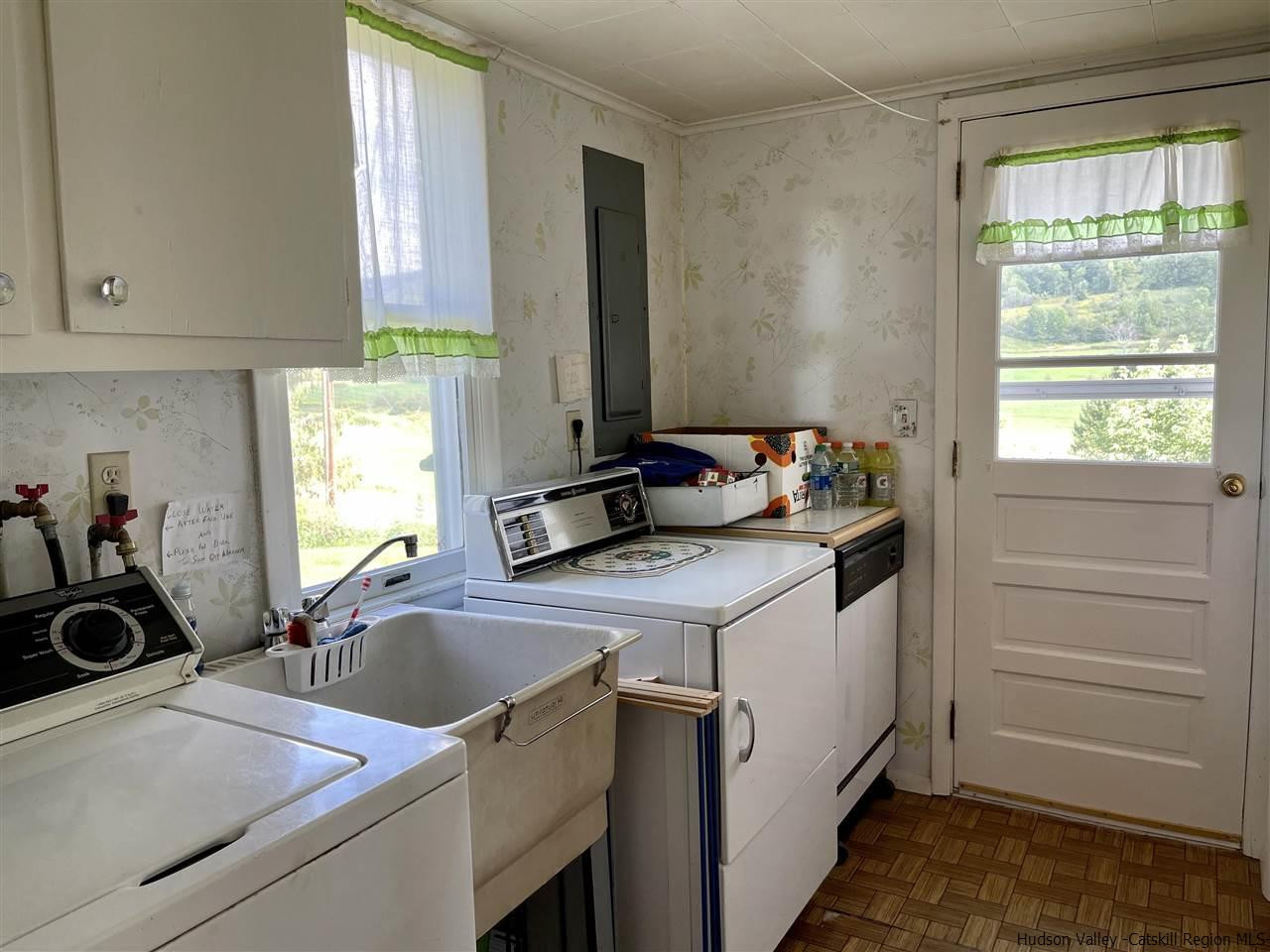 6277 County Rt 36 Denver, NY 12421 - Photo 24 of 27 a view of a kitchen sink and a window