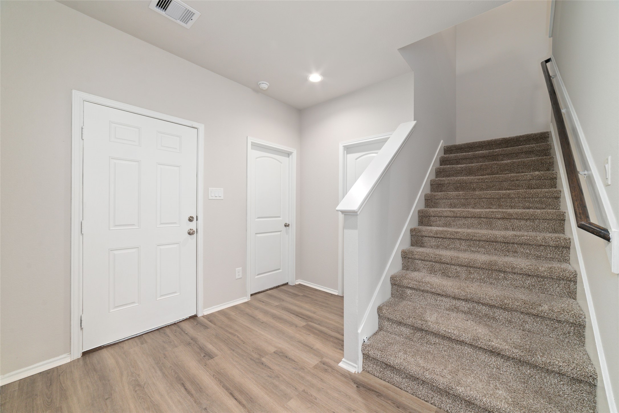 23702 Harrow Field Ln Spring Spring, TX 77373 - Photo 6 of 32 a view of entryway with wooden floor