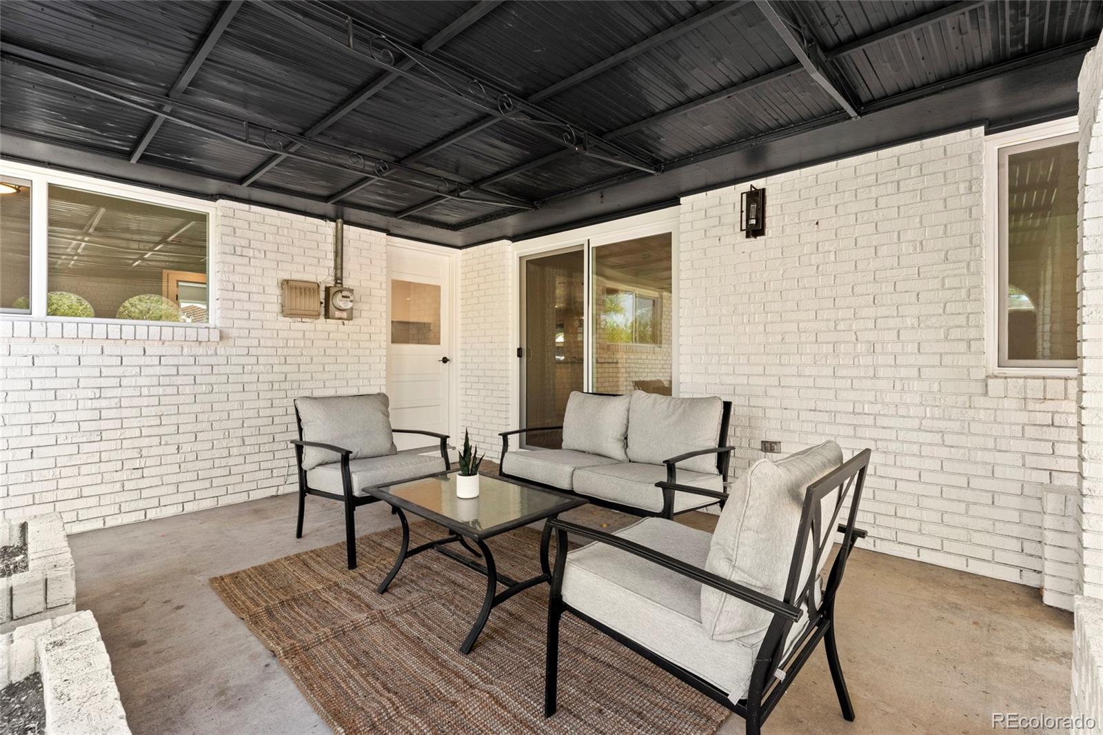 700 Busch Street Longmont, CO 80501 - Photo 23 of 27 a outdoor living space with furniture
