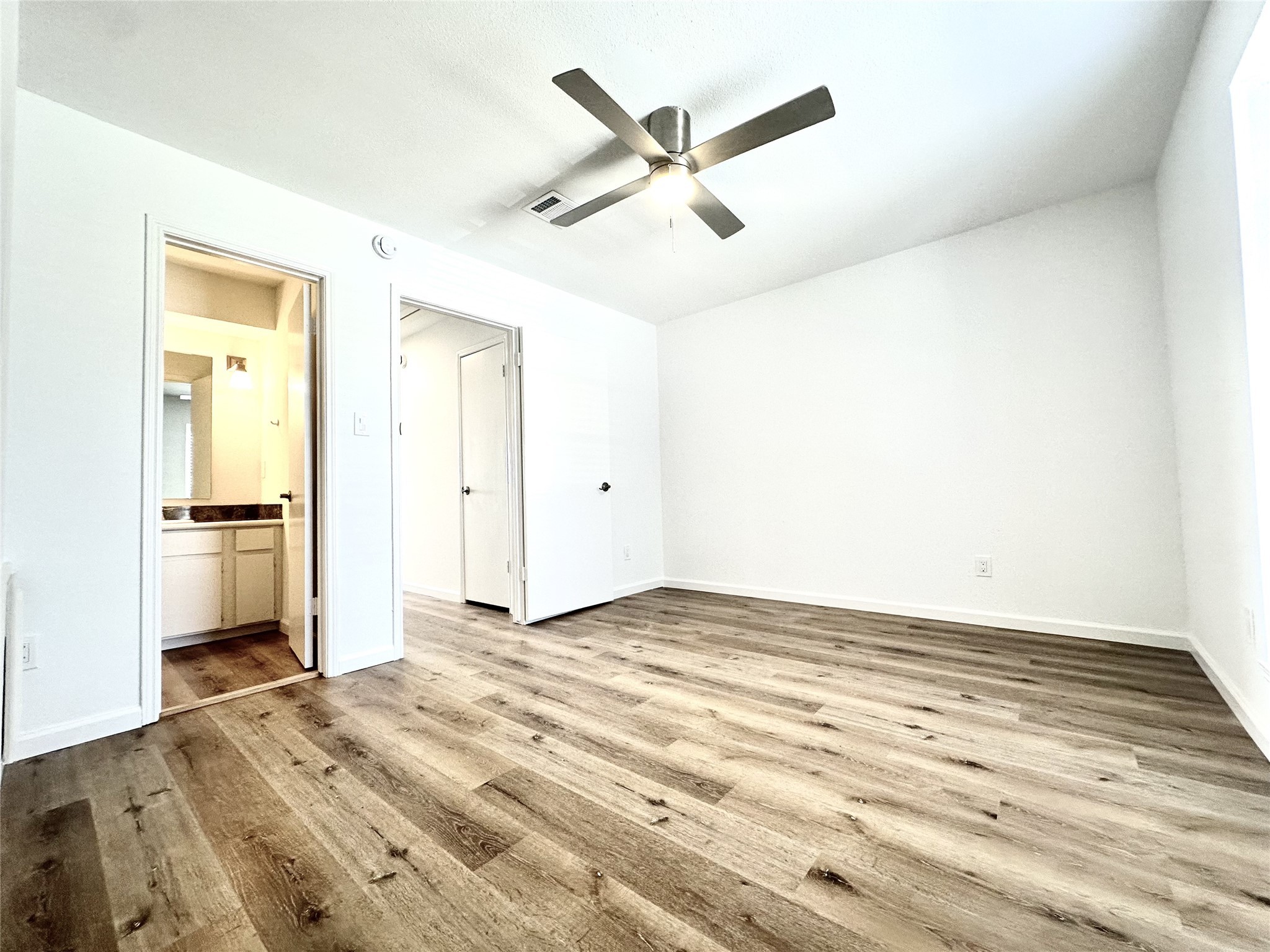 14771 Perthshire Road Houston, TX 77079 - Photo 11 of 23 wooden floor in an empty room