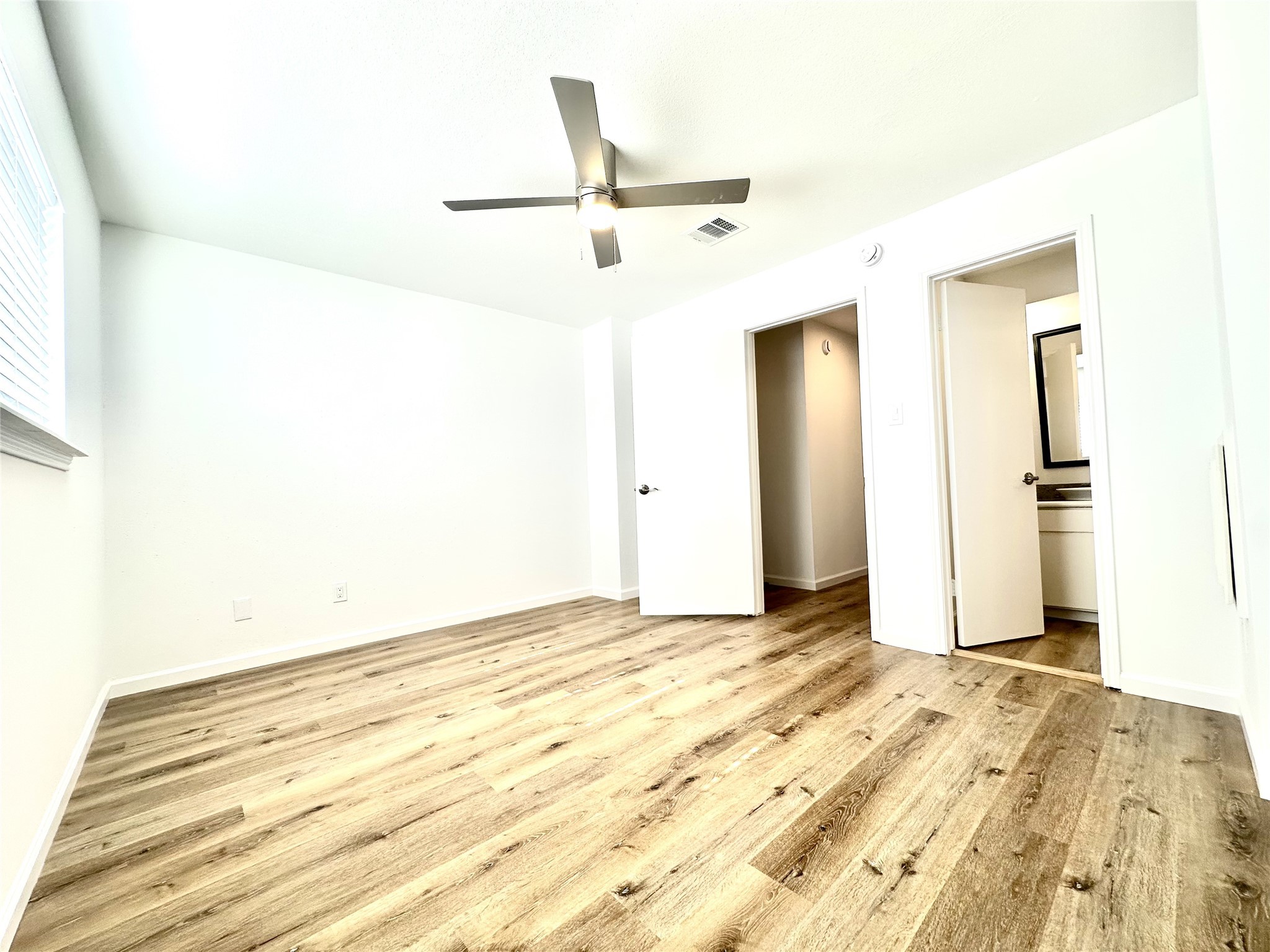 14771 Perthshire Road Houston, TX 77079 - Photo 19 of 23 a view of a livingroom with wooden floor
