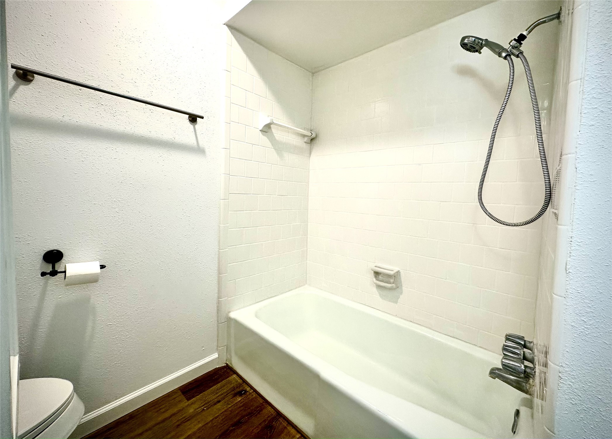 14771 Perthshire Road Houston, TX 77079 - Photo 21 of 23 a bathroom with a sink a bath tub and a shower